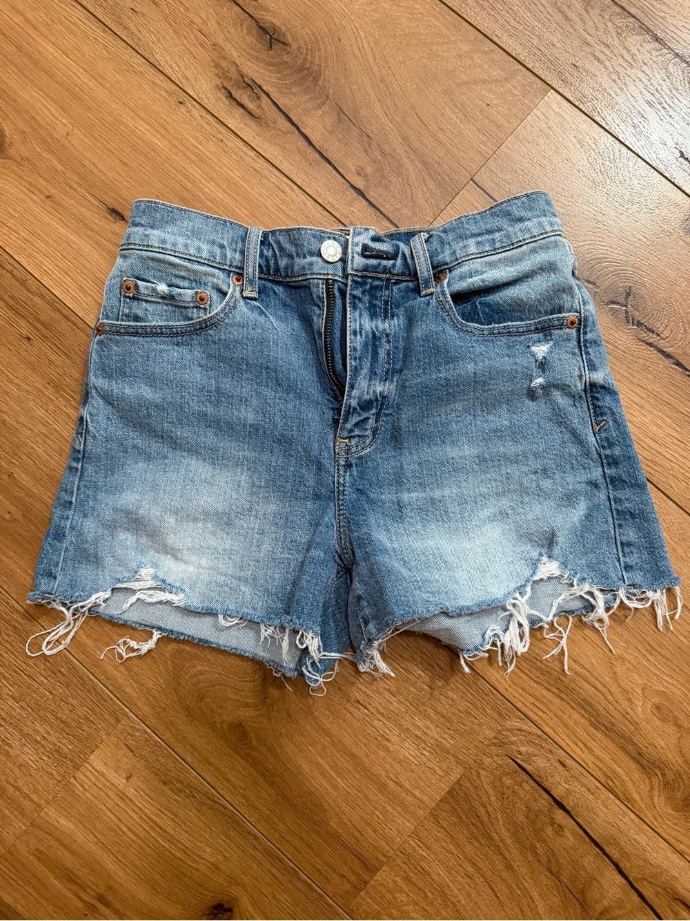 High-Rise Distressed Light Blue Denim Shorts